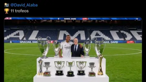 tạm biệt nhé! Mạng xã hội chính thức của Real Madrid đăng tải bức ảnh Alaba và chiếc cúp vô địch 11